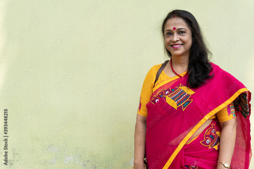 Middle aged Indian woman with traditional Sari Stock Photo | Adobe Stock
