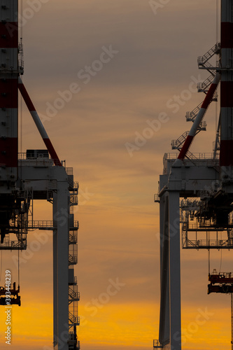 Port authority cargo cranes on wharf