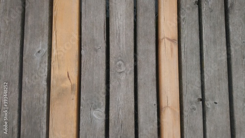 Wooden floor, contrast, old and new boards