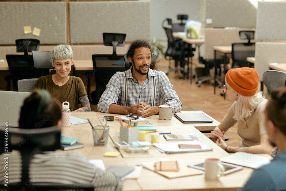 © Clique Images/Stocksy - Young Company Meeting In Office © Clique Images/Stocksy - Young Company Meeting In Office