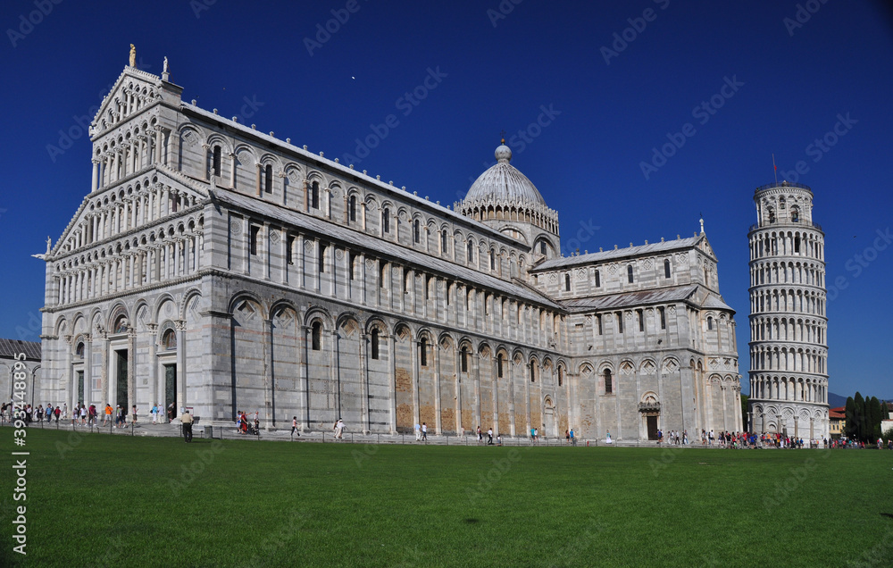 A view of the Basilica and the Leaning Tower seen in a side view.