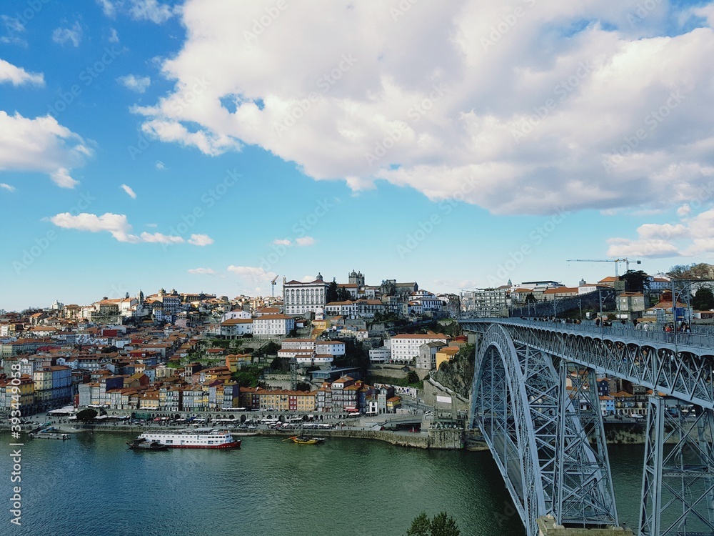 Follow the railroad straight to the city center of Porto.