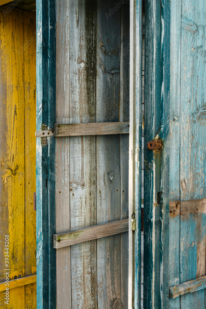 Texture of woonden green painted closet in decay Texture of woonden green painted closet in decay