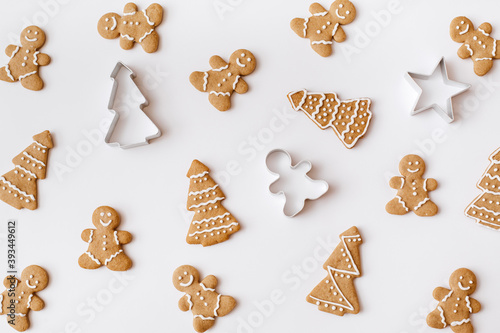 Homemade gingerbread cookies on white background. Christmas, winter, new year composition. Flat lay, top view