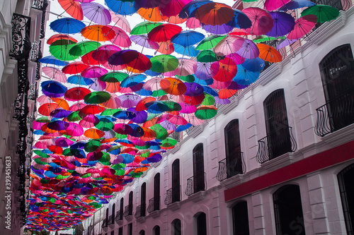 Detail of colorful umbrellas in the streets of the center of Caracas in Venezuela photo