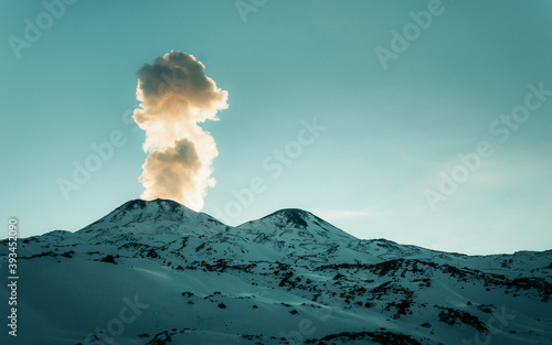 Sunrise at Termas de Chillan, overlooking the erupting volcano © Producciones