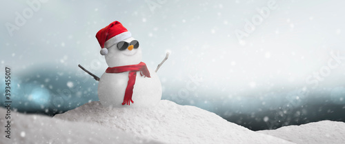 Fotografia Concept - happy snowman with sunglasses and santa hat in the north pole snow on