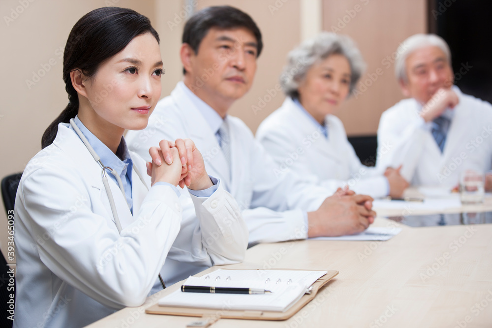 Medical experts holding a meeting Medical experts holding a meeting