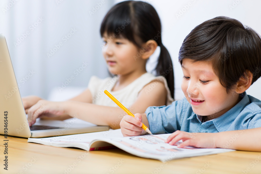 Little boy and girl doing homework Little boy and girl doing homework