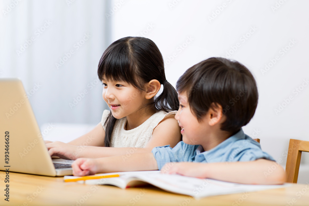 Little boy and girl doing homework Little boy and girl doing homework