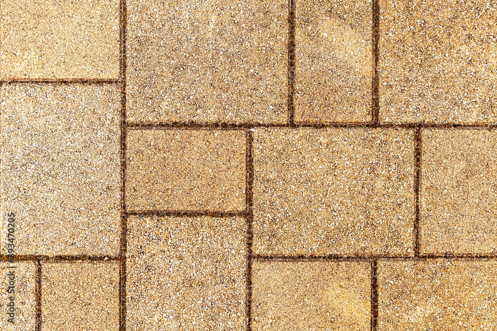 Fototapeta premium Vintage brown cobblestone pavement pattern and background