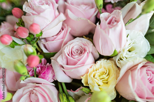 Bouquet of fresh pink flowers close up  holiday background.