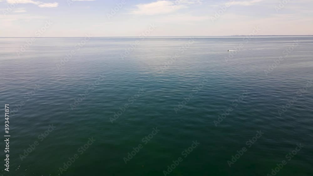 Jet ski in the Philip Bay with Melbourne in the background drone aerial Jet ski in the Philip Bay with Melbourne in the background drone aerial