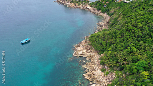 Aerial drone view over Sai Deng Beach on the paradise diving island of Koh Tao in the Gulf of Thailand © Kim