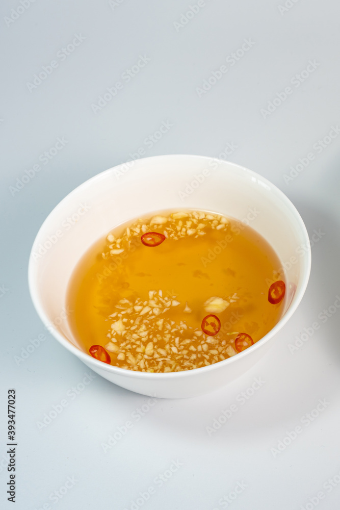 Homemade Vietnamese sweet fish sauce with chili pepper and garlic Homemade Vietnamese sweet fish sauce with chili pepper and garlic