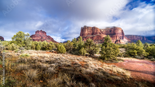 The red rock sandstone mountains of Bell Rock, Munds Mountain and Courthouse Butte near Sedona in Northern Arizona in Coconino National Forest in the United States