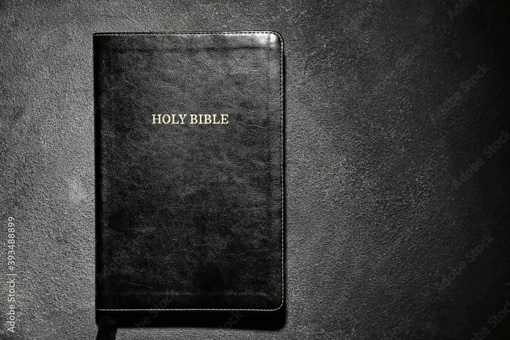 Hole Bible On Dark Background Stock Photo | Adobe Stock