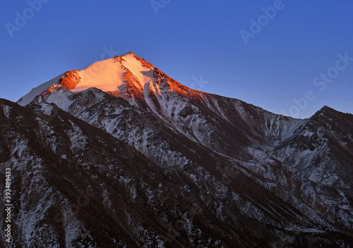 Majestic mountain peak at sunset
