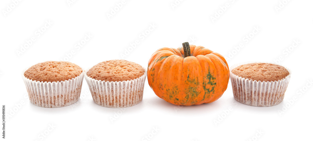 Tasty pumpkin muffins on white background Tasty pumpkin muffins on white background