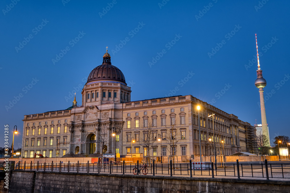 The reconstructed Berlin City Palace with the Television Tower at night