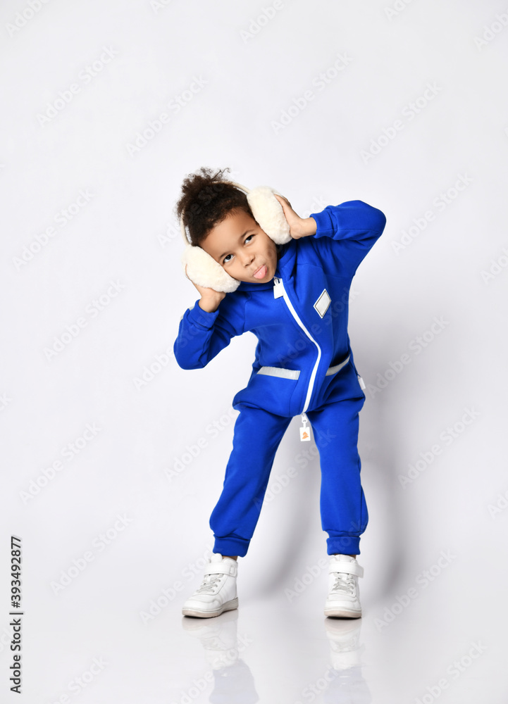 Premium Photo | Elegant young woman in green jumpsuit sneakers on white  background studio shot full length
