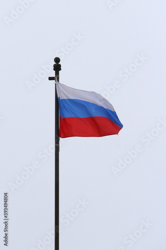 Free Download Russian flag on a light sky background, white, blue and red tricolor - GFXLoad