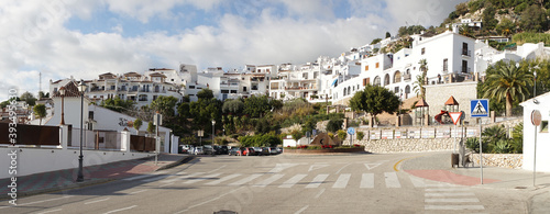 Nerja village architecture with white painted houses along the Costa del Sol in Spain.