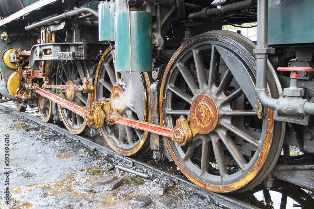 The train wheel of Steam locomotive prepares to depart Start the steam generator. The train wheel of Steam locomotive prepares to depart Start the steam generator.