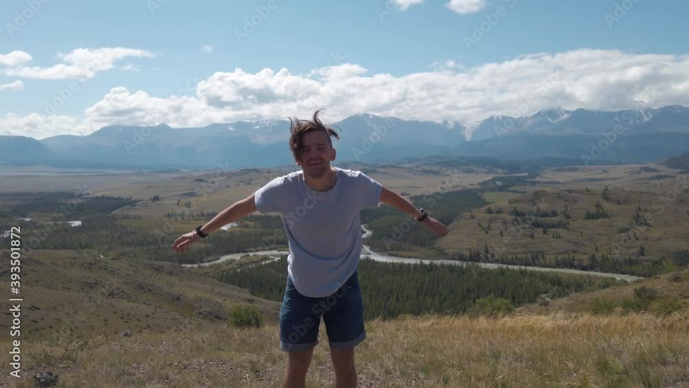 Man in Altai mountains. Resting in mountains concept Man in Altai mountains. Resting in mountains concept