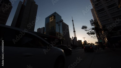 time lapse ao entardecer da avenida paulista próximo a rua augusta e bela cintra photo