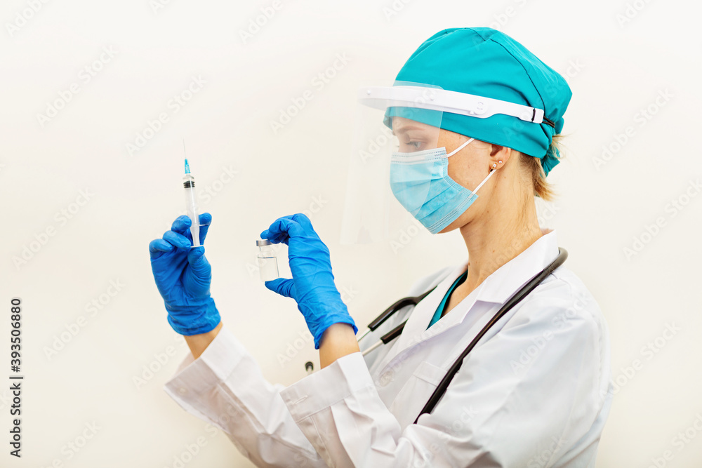 Doctor or nurse holding hands flu vaccine on beige background, measles injection syringe for baby, man, woman vaccination, medicine and drug concept. Vaccination against Coronavirus covid-19 pandemic Doctor or nurse holding hands flu vaccine on beige background, measles injection syringe for baby, man, woman vaccination, medicine and drug concept. Vaccination against Coronavirus covid-19 pandemic