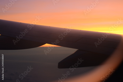 Sunrise behind window plane