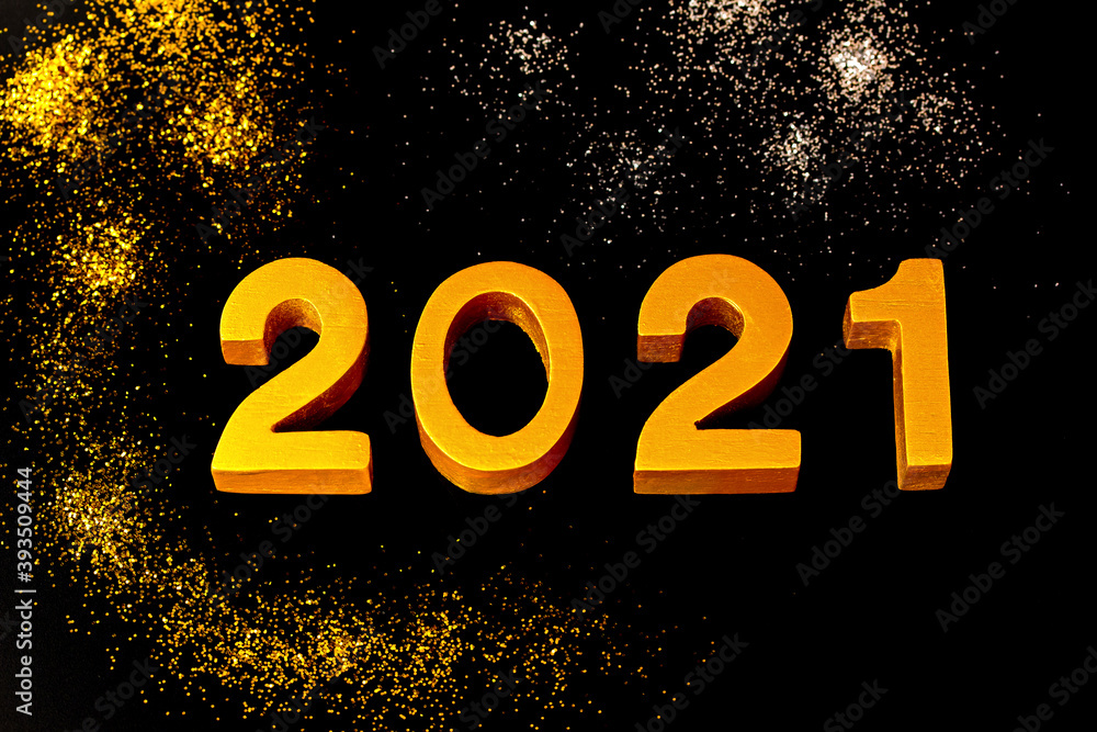 2021 made of wood and gold painted on black background 2021 made of wood and gold painted on black background
