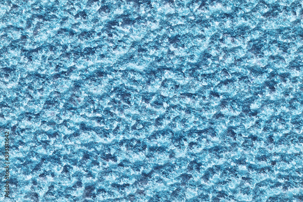 The rough surface of cement plaster background. Empty surface close-up. The rough surface of cement plaster background. Empty surface close-up.