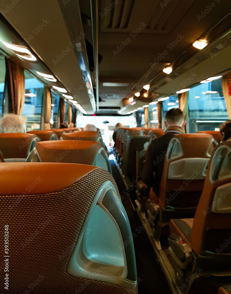 inside the big tourist bus with people