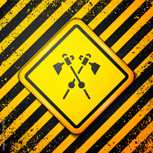 Black Crossed medieval axes icon isolated on yellow background. Battle axe, executioner axe. Medieval weapon. Warning sign. Vector.