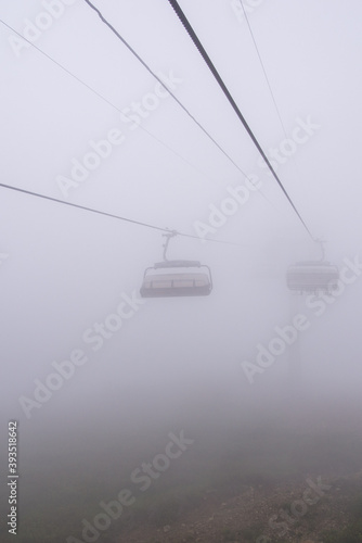 Chairlift in a mountain region in summer. Life of ski resort in summertime