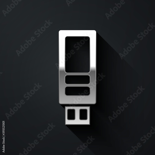 Silver USB flash drive icon isolated on black background. Long shadow style. Vector.