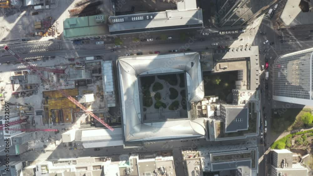 Birds Eye View of City with Traffic on Streets and Office Building Rooftop Garden, Aerial View Birds Eye View of City with Traffic on Streets and Office Building Rooftop Garden, Aerial View