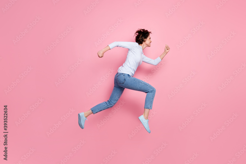 Full body profile side photo of cheerful energetic girl run jump discounts isolated pastel color background