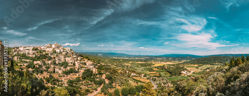 Gordes, Provence, France. Beautiful Scenic View Of Medieval Hilltop Village Of Gordes. Sunny Summer Sky. Famous Landmark. panorama scenic view