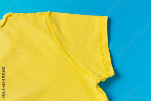 Yellow t-shirt on a blue background