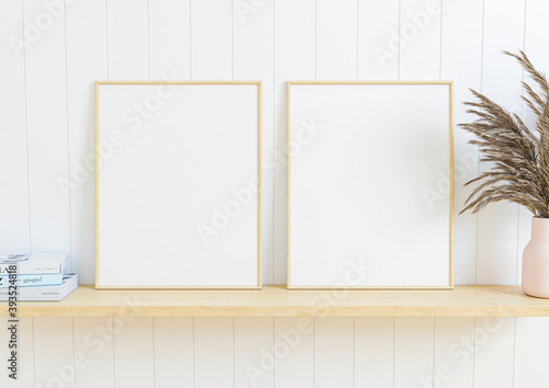 Double 8x10 Vertical Wooden Frame mockup with decorations on wooden shelf and wooden wall. 3D Rendering