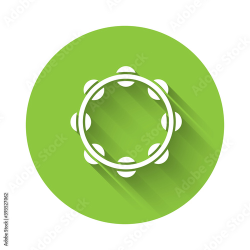 White Musical instrument percussion tambourine, with metal plates icon isolated with long shadow. Green circle button. Vector.