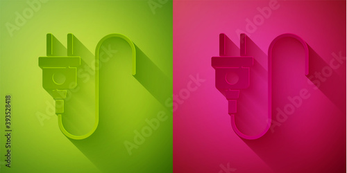 Paper cut Electric plug icon isolated on green and pink background. Concept of connection and disconnection of the electricity. Paper art style. Vector.