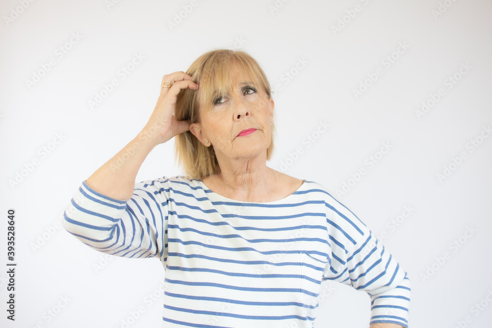 woman over isolated background confuse and wonder about question. Uncertain with doubt, thinking with hand on head. Pensive concept. woman over isolated background confuse and wonder about question. Uncertain with doubt, thinking with hand on head. Pensive concept.