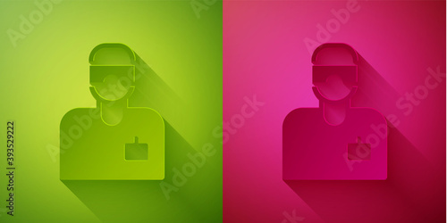 Paper cut Laboratory assistant icon isolated on green and pink background. Paper art style. Vector.