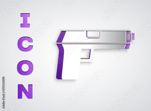 Paper cut Pistol or gun icon isolated on grey background. Police or military handgun. Small firearm. Paper art style. Vector.