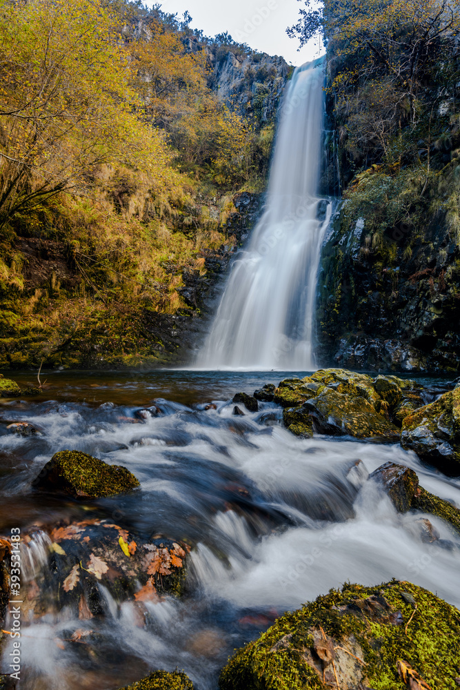 view of the Cascada de Cioyo waterfalls in Asturias in late autumn