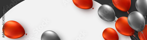 Red and silver foil balloons with threads on white round background.